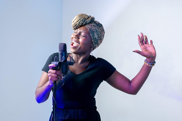 Lady recording music for teaching